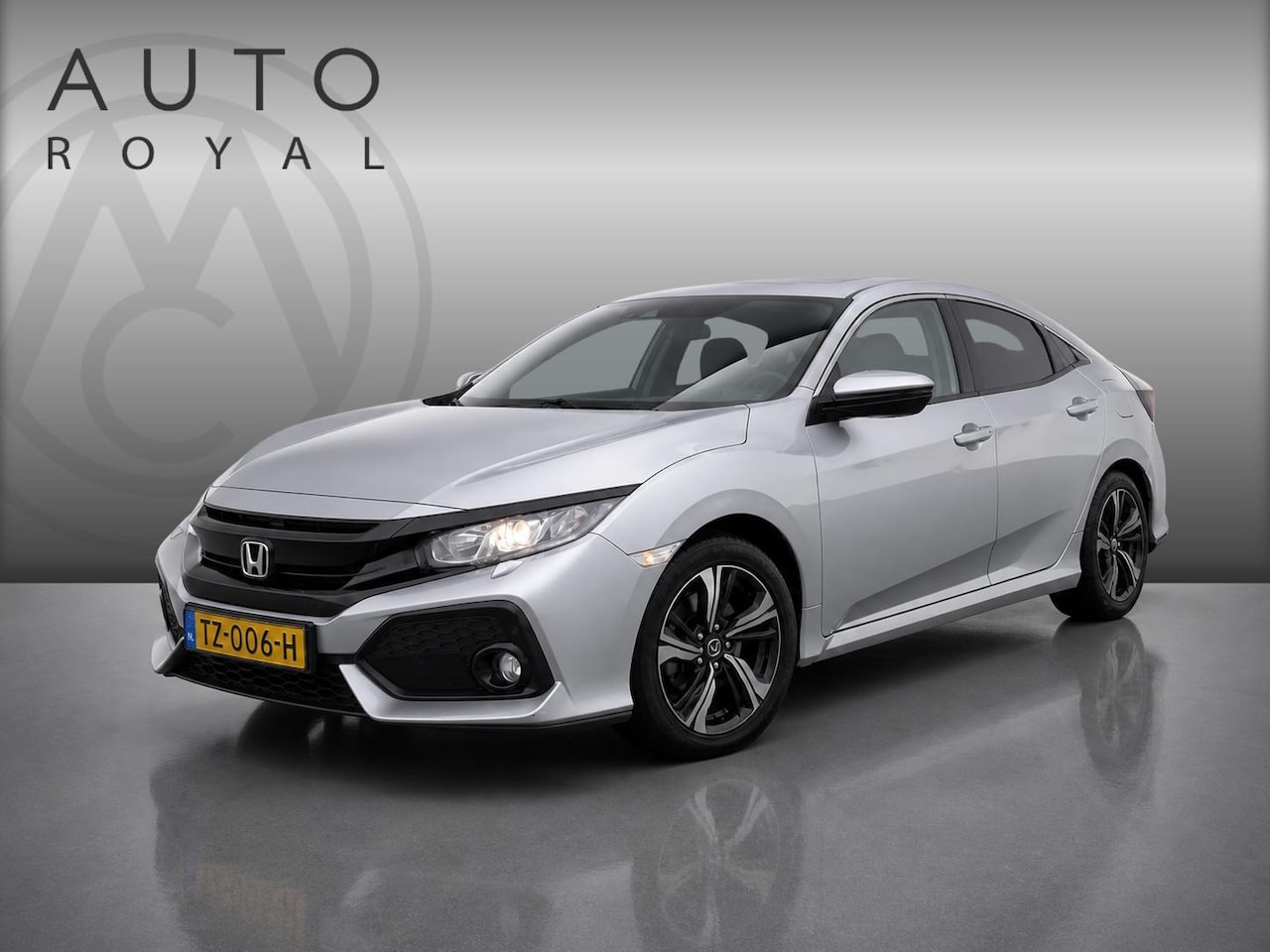 Honda Civic - 1.0 i-VTEC Elegance NAVIGATIE | STOELVERWARMING | PARKEERSENSOREN | AIRCO/ECC | CRUISE CON - AutoWereld.nl