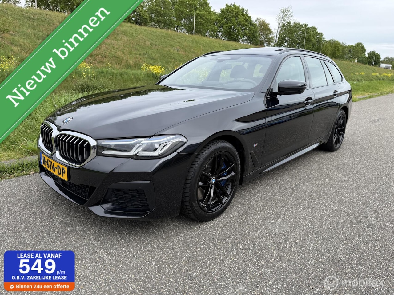 BMW 5-serie Touring - 530d High Executive panoramadak - AutoWereld.nl