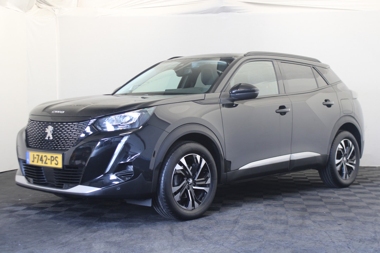 Peugeot 2008 - 1.2 PureTech Blue Lease Allure |Stoelverw.|Camera|Navi| - AutoWereld.nl