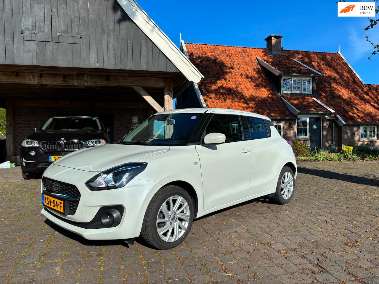 Suzuki Swift - 1.2 Style Smart Hybrid 1.2 Style Smart Hybrid - AutoWereld.nl