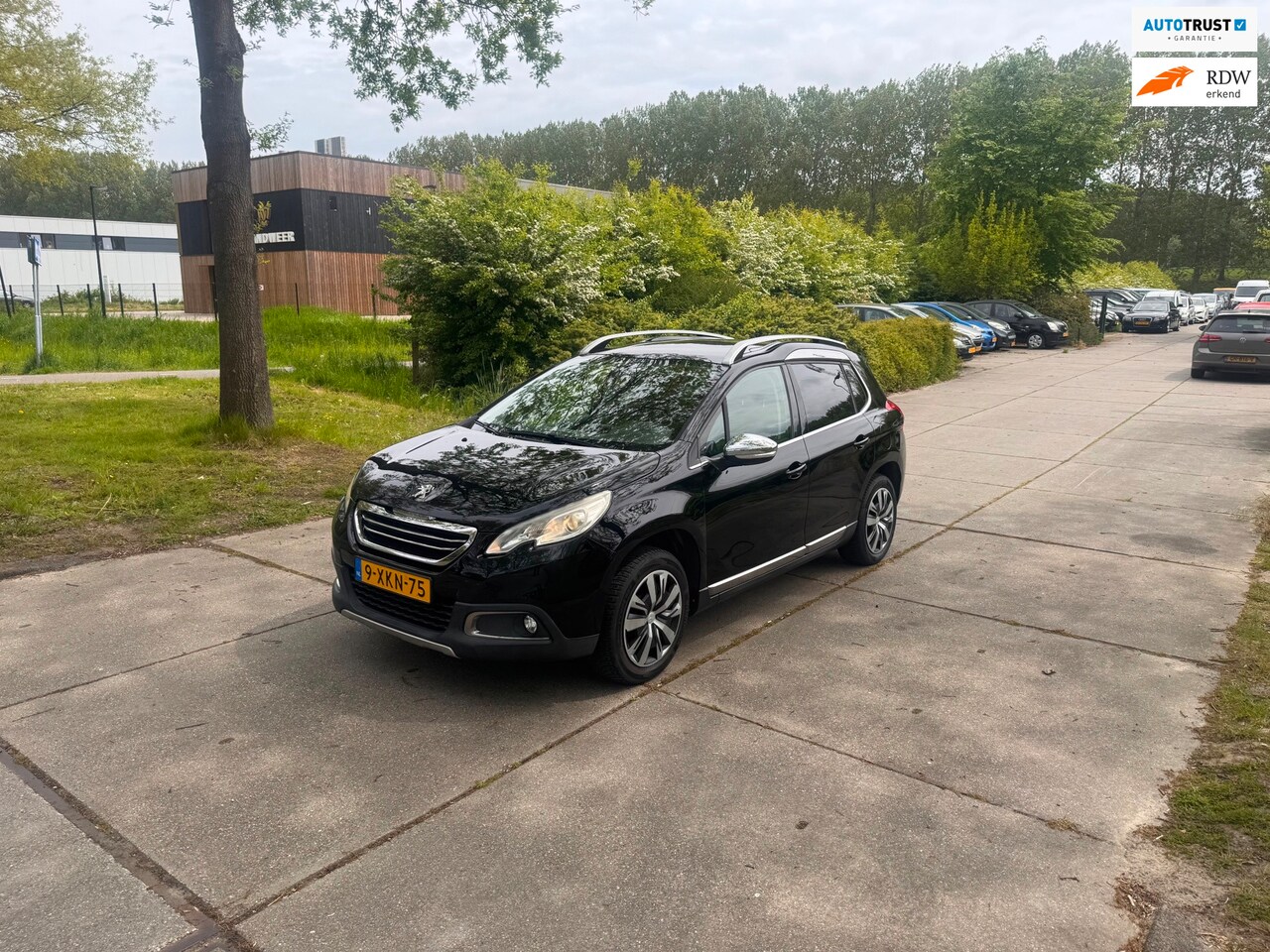 Peugeot 2008 - 1.2 VTi Allure Pack Premium Plus Pano.Clima.Navi - AutoWereld.nl