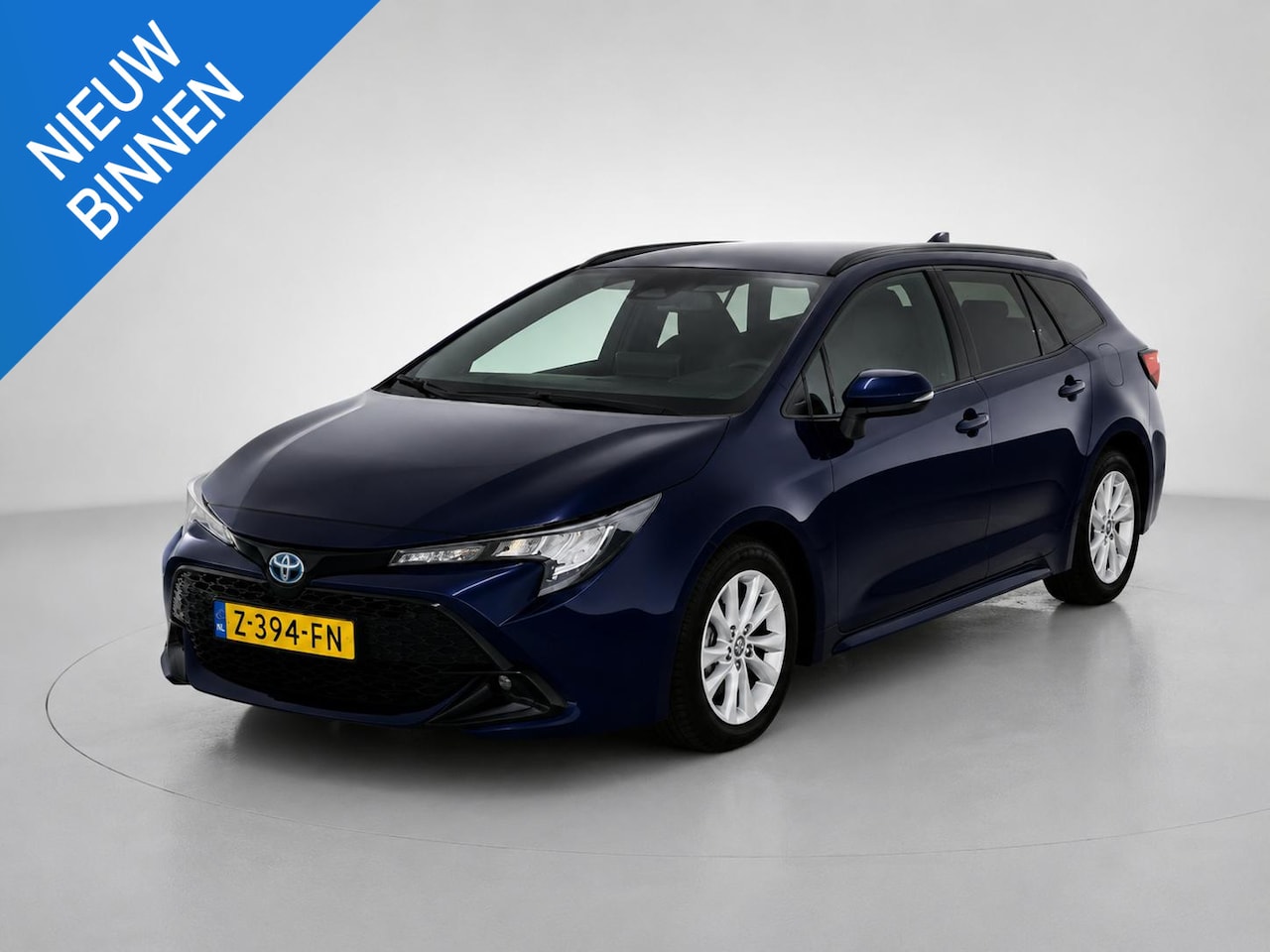 Toyota Corolla Touring Sports - HYBRID 140 ACTIVE I APPLE/ANDROID I P-CAMERA I CLIMATE CONTROL I CRUISE CONTROL - AutoWereld.nl