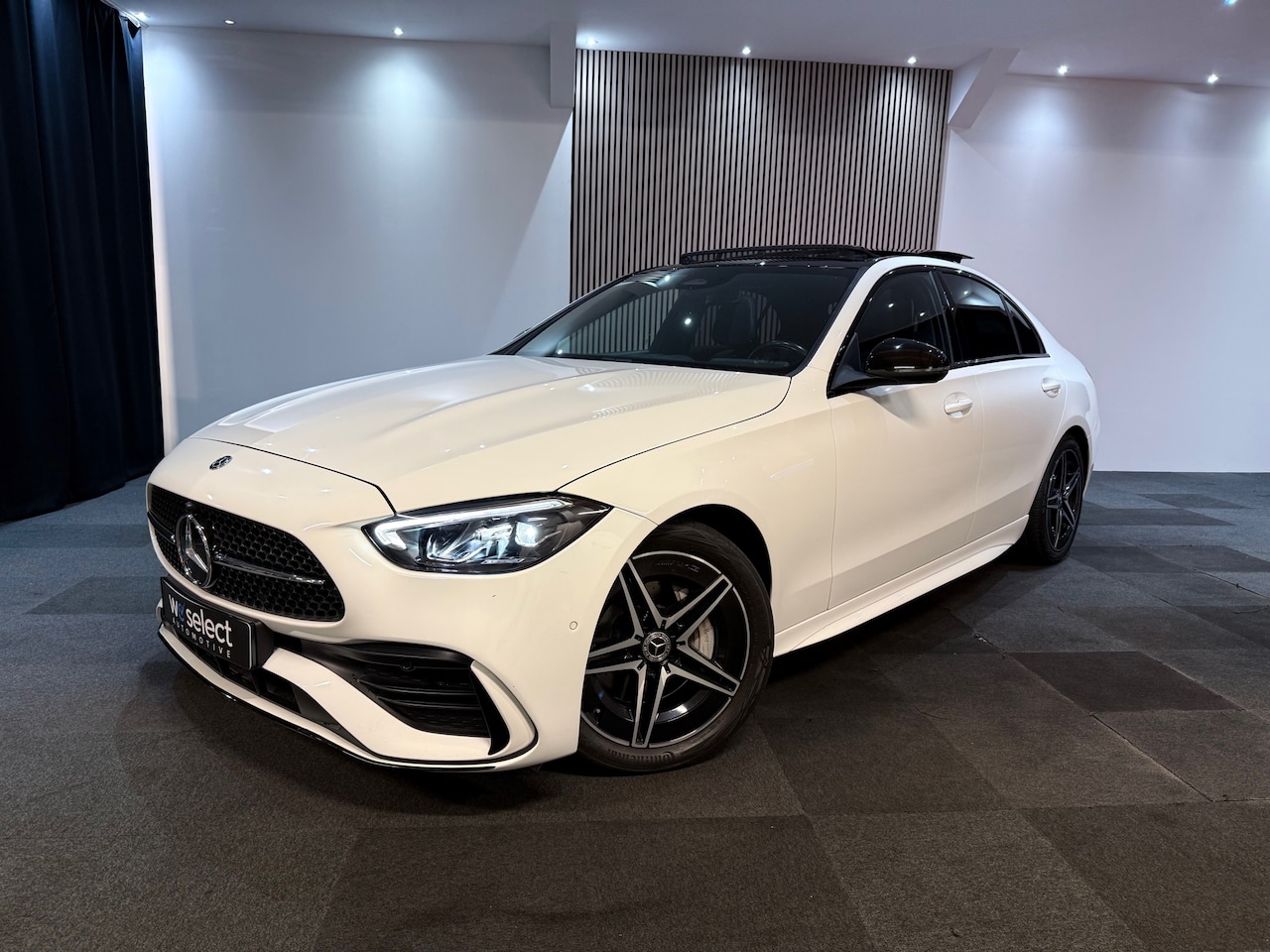 Mercedes-Benz C-klasse - 200 4MATIC AMG Pano l Ambient l Camera l Memory l Leder l ACC l Carbon l Burmester - AutoWereld.nl