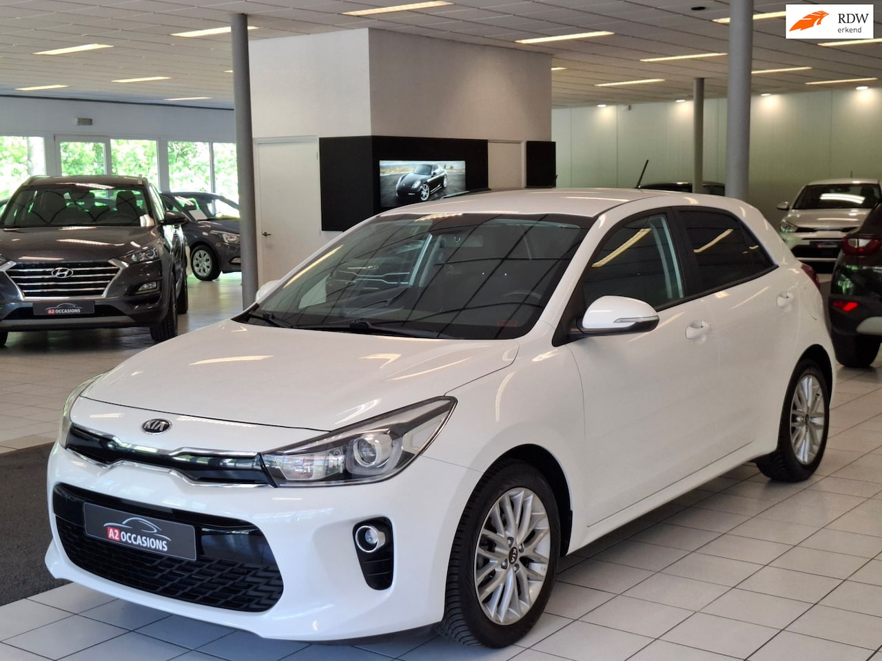 Kia Rio - 1.2 (4 Cil) Bluetooth/PDC/Stoel en stuurverwarming - AutoWereld.nl