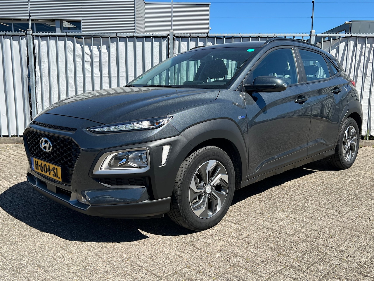 Hyundai Kona - 1.6 GDI 141pk HEV Comfort | Camera | Climate controle | Navigatie | Carplay | Lichtmetalen - AutoWereld.nl