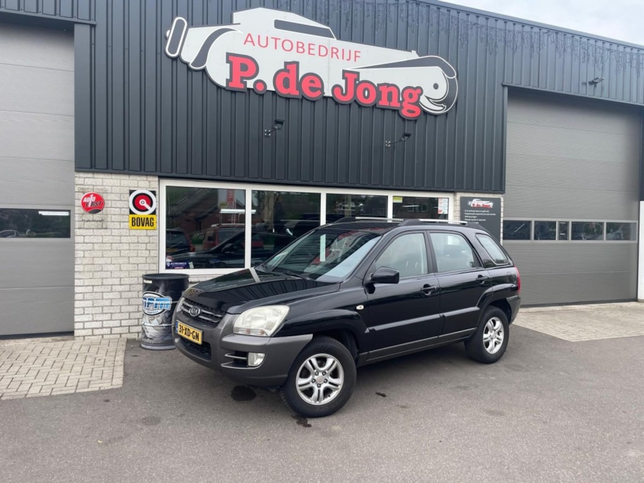 Kia Sportage - 2.0 CVVT X-ECUTIVE Trekhaak - Airco - Cruise - AutoWereld.nl