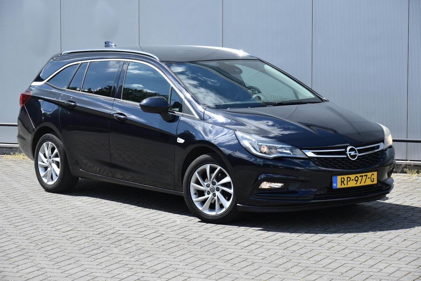 Opel Astra Sports Tourer - 1.0 Business Executive Clima Navi - AutoWereld.nl