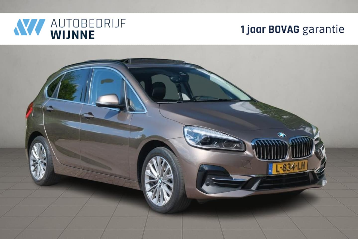 BMW 2-serie Active Tourer - 225xe iPerformance High Executive | SOH 87% | Navi | App Connect | Panoramadak | Keyless | - AutoWereld.nl