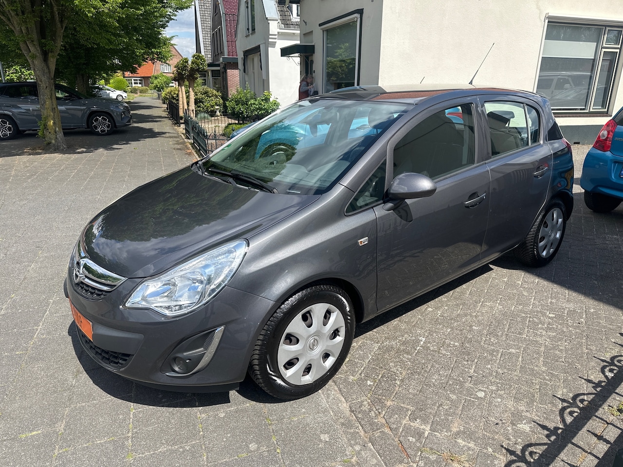 Opel Corsa - 1.4-16V Anniversary Edition 1.4-16V Anniversary Edition - AutoWereld.nl