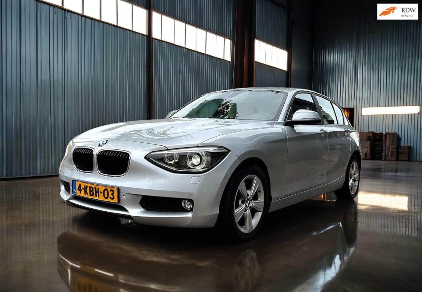 BMW 1-serie - 118i Upgrade Edition Leder_Led_Xenon_Navi_Cruise - AutoWereld.nl