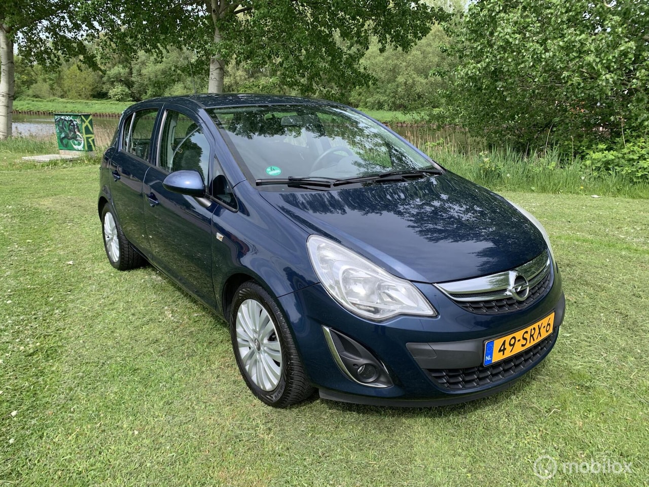 Opel Corsa - 1.2-16V Cosmo 1.2-16V Cosmo - AutoWereld.nl