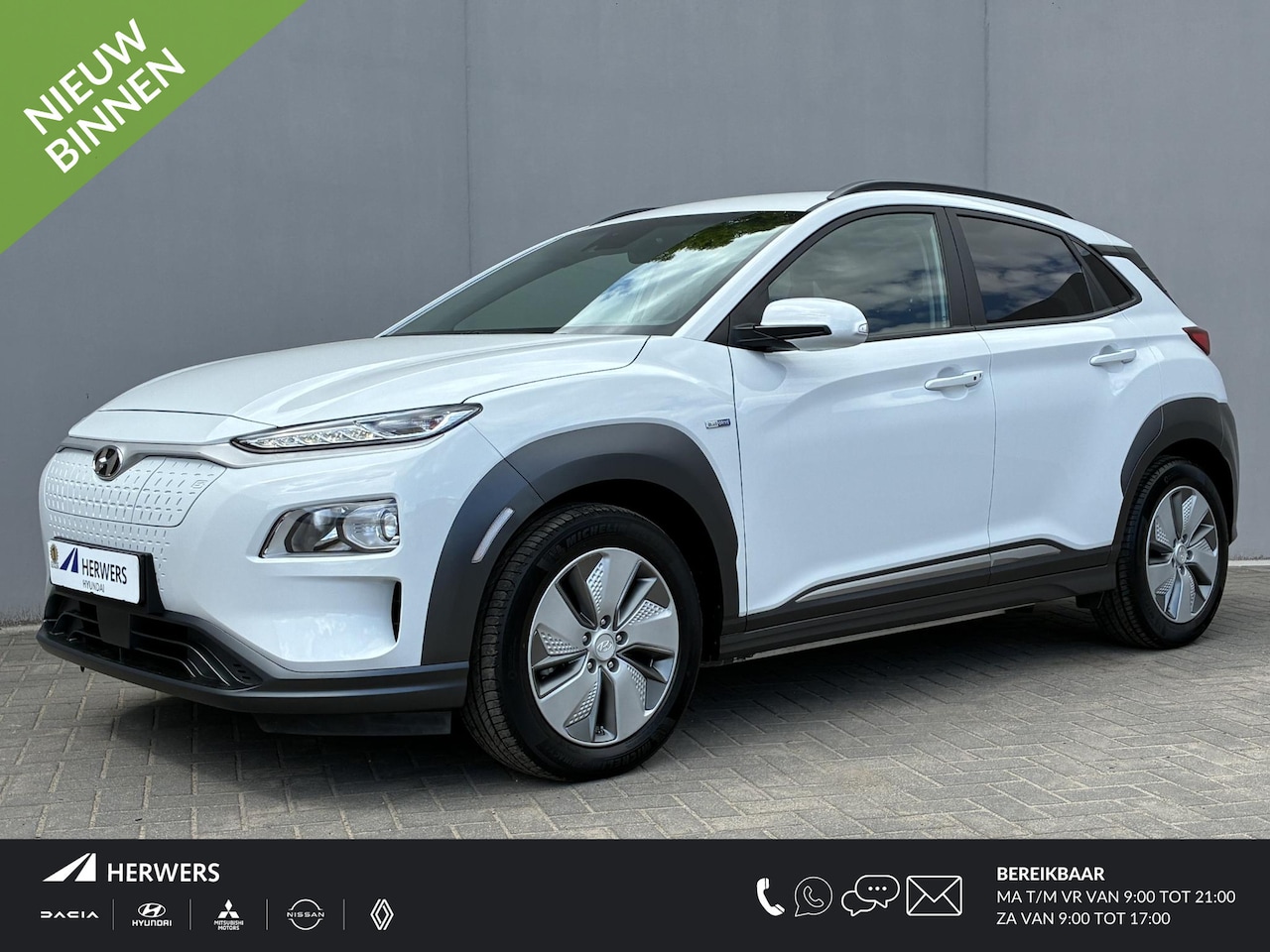 Hyundai Kona Electric - EV Comfort Smart 39 kWh / Accu SoH 100% / CCS Snelladen / Stoelverwarming / Adaptief cruis - AutoWereld.nl