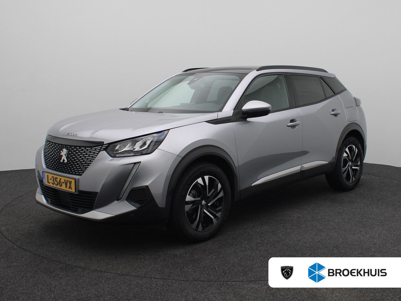 Peugeot 2008 - 1.2 PureTech Blue Lease Allure | Achteruitrijcamera | Airco (automatisch) | Apple Carplay/ - AutoWereld.nl