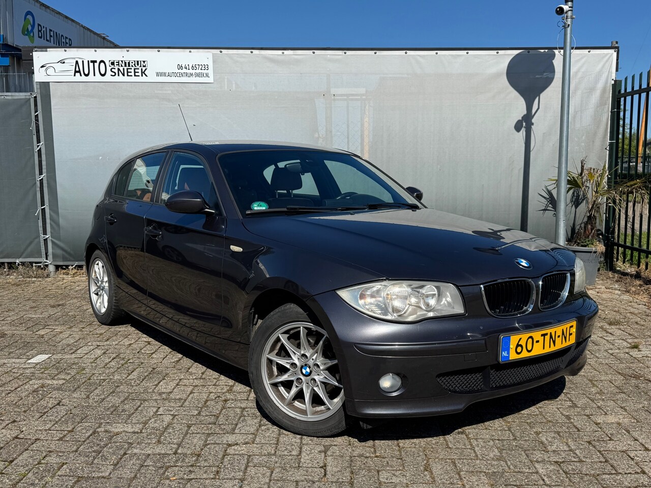 BMW 1-serie - 120i Graphite -Clima-Cruise-PDC-Leder-APK 05-27 - AutoWereld.nl