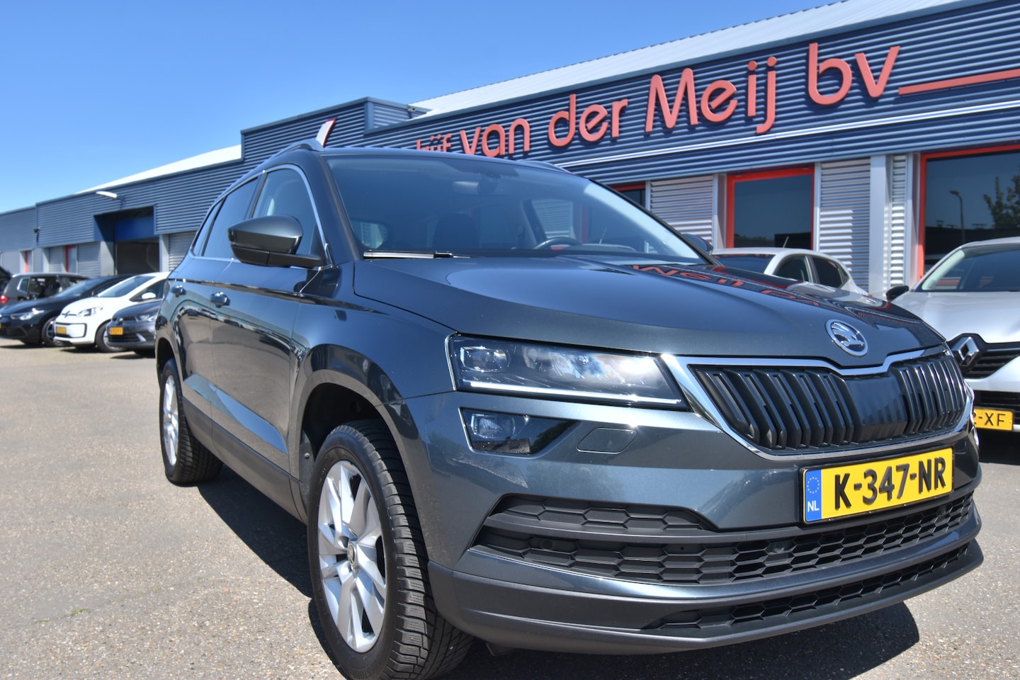 Skoda Karoq - 1.0 TSI Business Edition Plus 1.0 TSI Business Edition Plus , TREKHAAK , CLIMATR , NAVI , A UITRIJ CAM , PDC V+A , - AutoWereld.nl