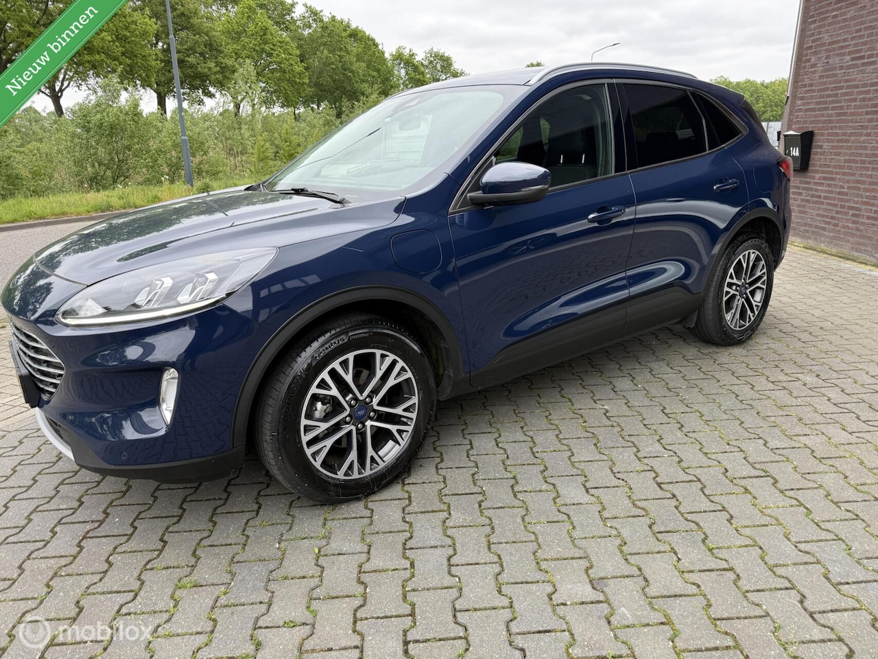 Ford Kuga - 2.5 PHEV Titanium 2.5 PHEV Titanium - AutoWereld.nl