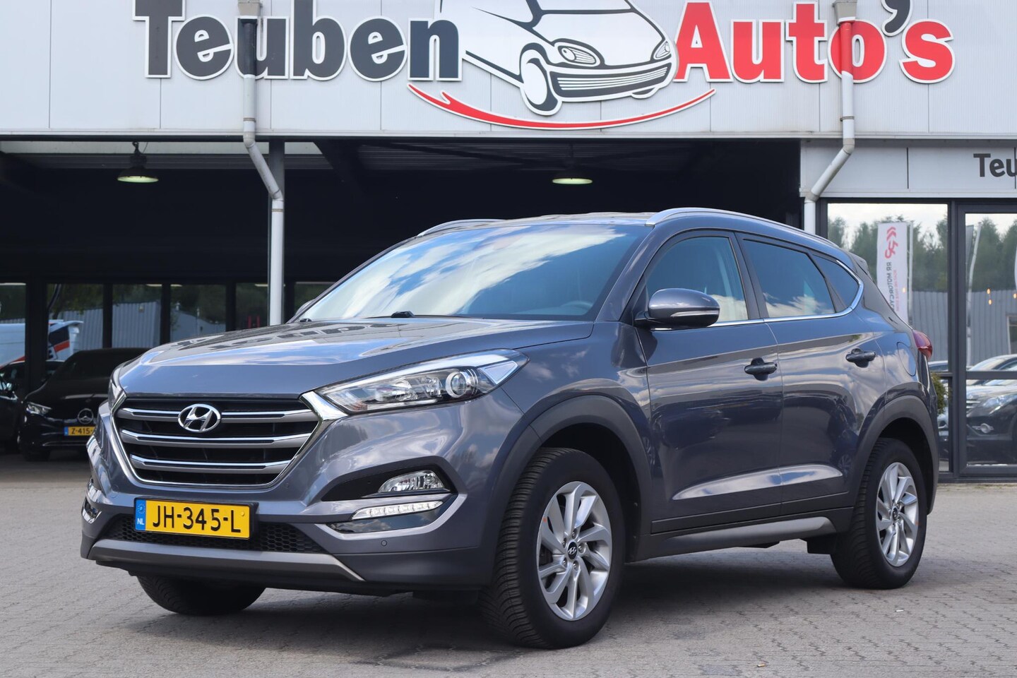 Hyundai Tucson - 1.6 GDi Comfort | NL Auto | Camera | Leder | Stoelverwarming | PDC voor en achter - AutoWereld.nl
