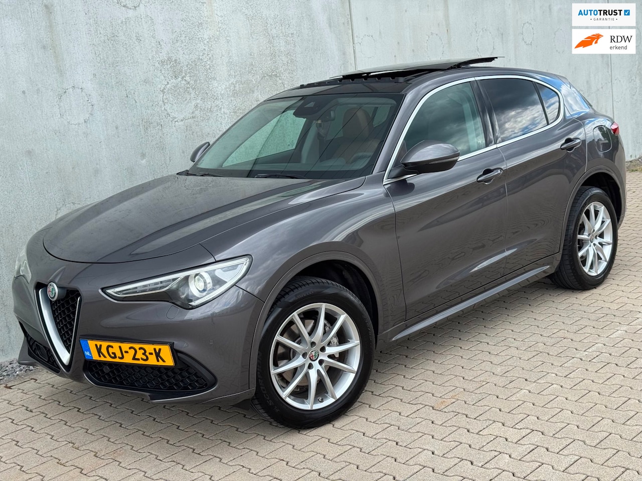 Alfa Romeo Stelvio - 2.0 T AWD Ti Pano Navi Leer Trekhaak Adapt Cruise Vol - AutoWereld.nl