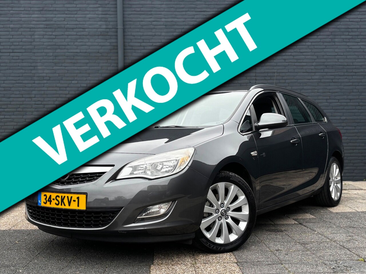 Opel Astra Sports Tourer - 1.4 Turbo | Navi | Camera - AutoWereld.nl
