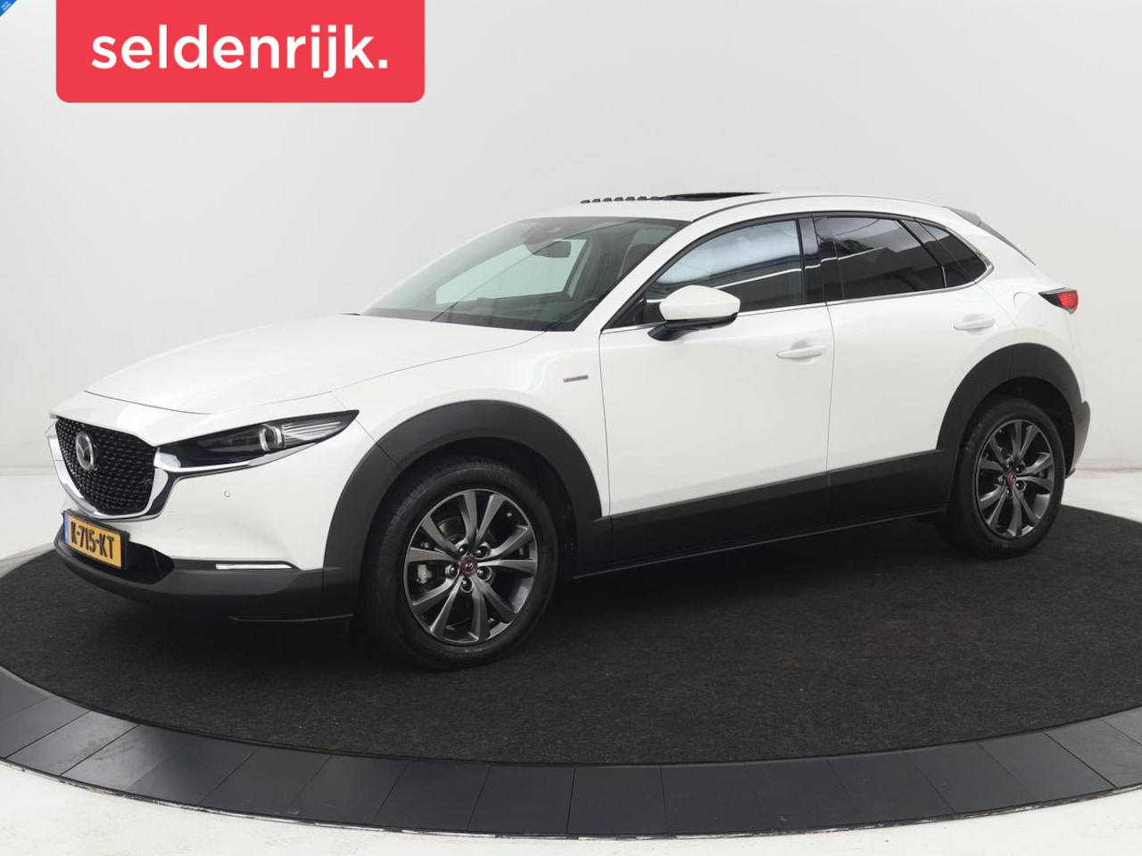 Mazda CX-30 - 2.0 e-SkyActiv-X M Hybrid 100th Anniversary Edition | Schuifdak | Leder | Trekhaak | 360 C - AutoWereld.nl