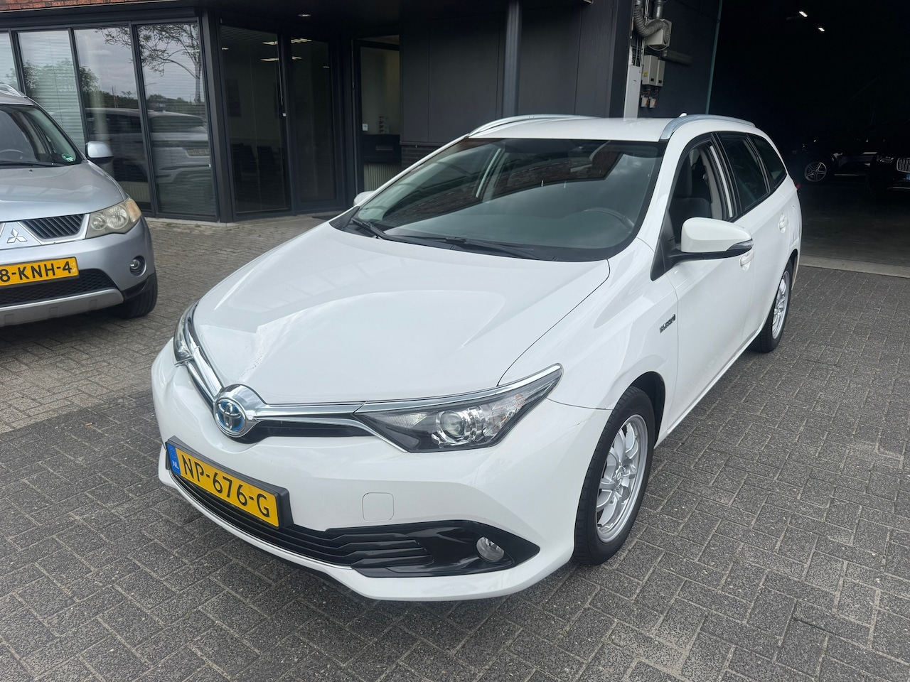 Toyota Auris Touring Sports - 1.8 Hybrid Business Pro CAMERA CRUISE DEALER ONDERHOUDEN - AutoWereld.nl