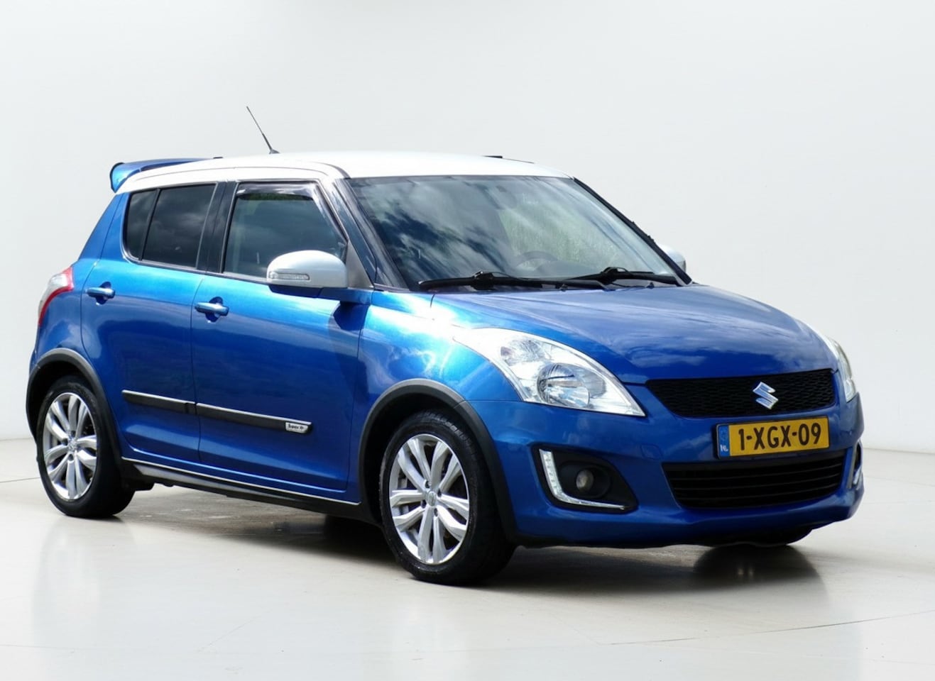 Suzuki Swift - 1.2 Exclusive EASSS|Cruise|Clima|PDC|Stoelverw. - AutoWereld.nl