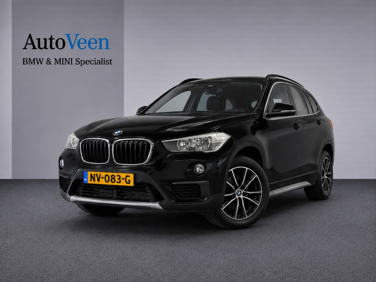 BMW X1 - SDrive18i Centennial High Executive (STOELVERWARMING, CRUISE, NAVI, PARKEERSENSOREN) - AutoWereld.nl