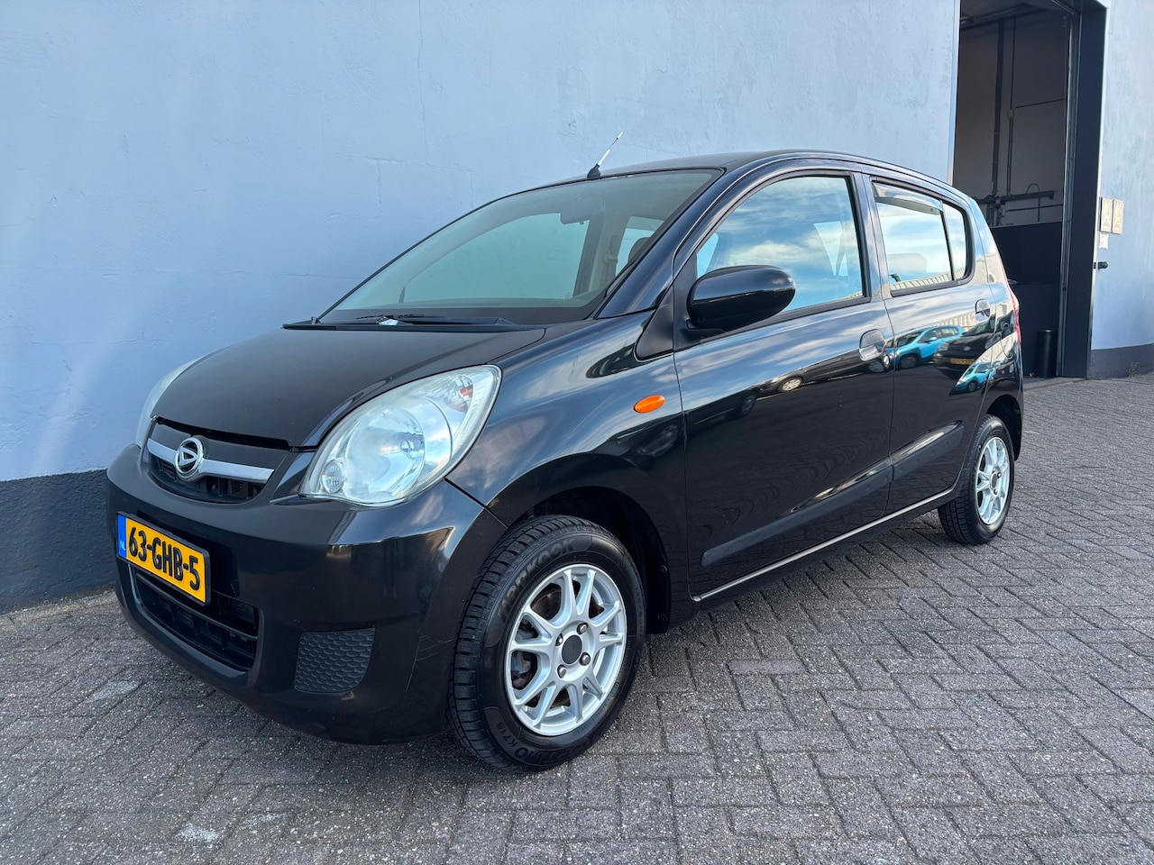 Daihatsu Cuore - 1.0 Premium 5-Deurs - Airco - Cruise Control - AutoWereld.nl