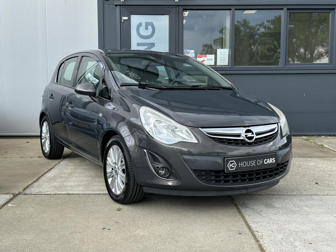Opel Corsa - 1.4 16V Cosmo 5-Deurs CLima Cruise Navi PDC 101PK - AutoWereld.nl