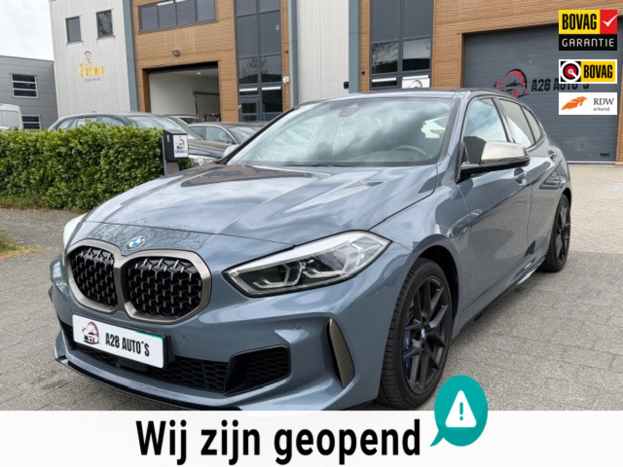 BMW 1-serie - M135i xDrive Executive | Head up CarPlay| Automaat | NAP | Garantie - AutoWereld.nl