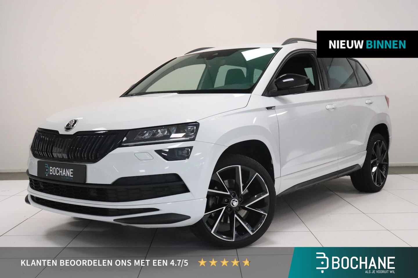 Skoda Karoq - 1.5 TSI ACT Sportline Business | Camera | Adaptieve cruise | LED koplampen | Trekhaak | St - AutoWereld.nl