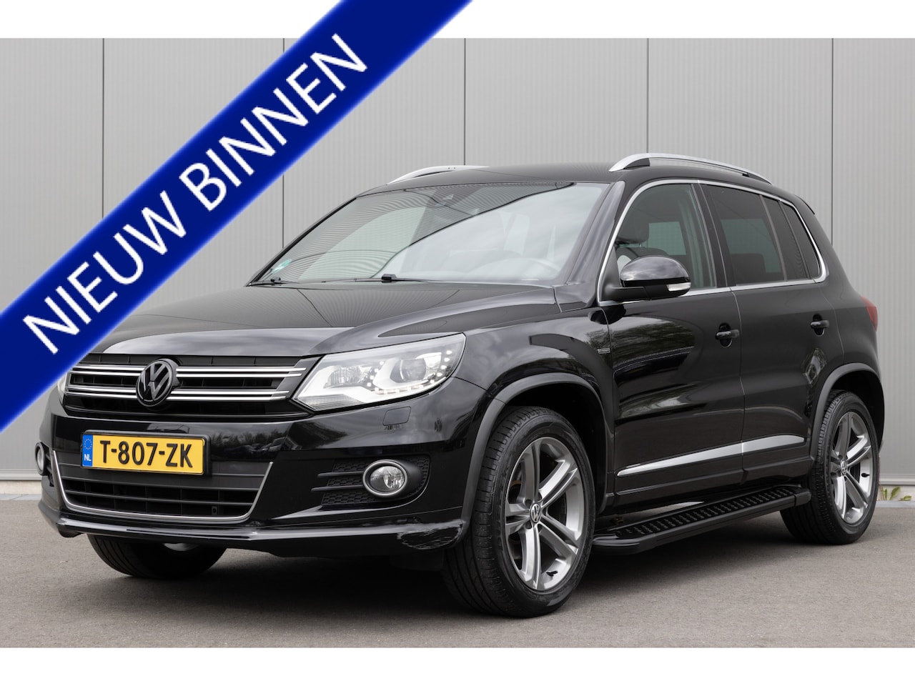 Volkswagen Tiguan - | 160 PK | NAVI | STOELVERWARMING | CRUISE | TREKHAAK - AutoWereld.nl