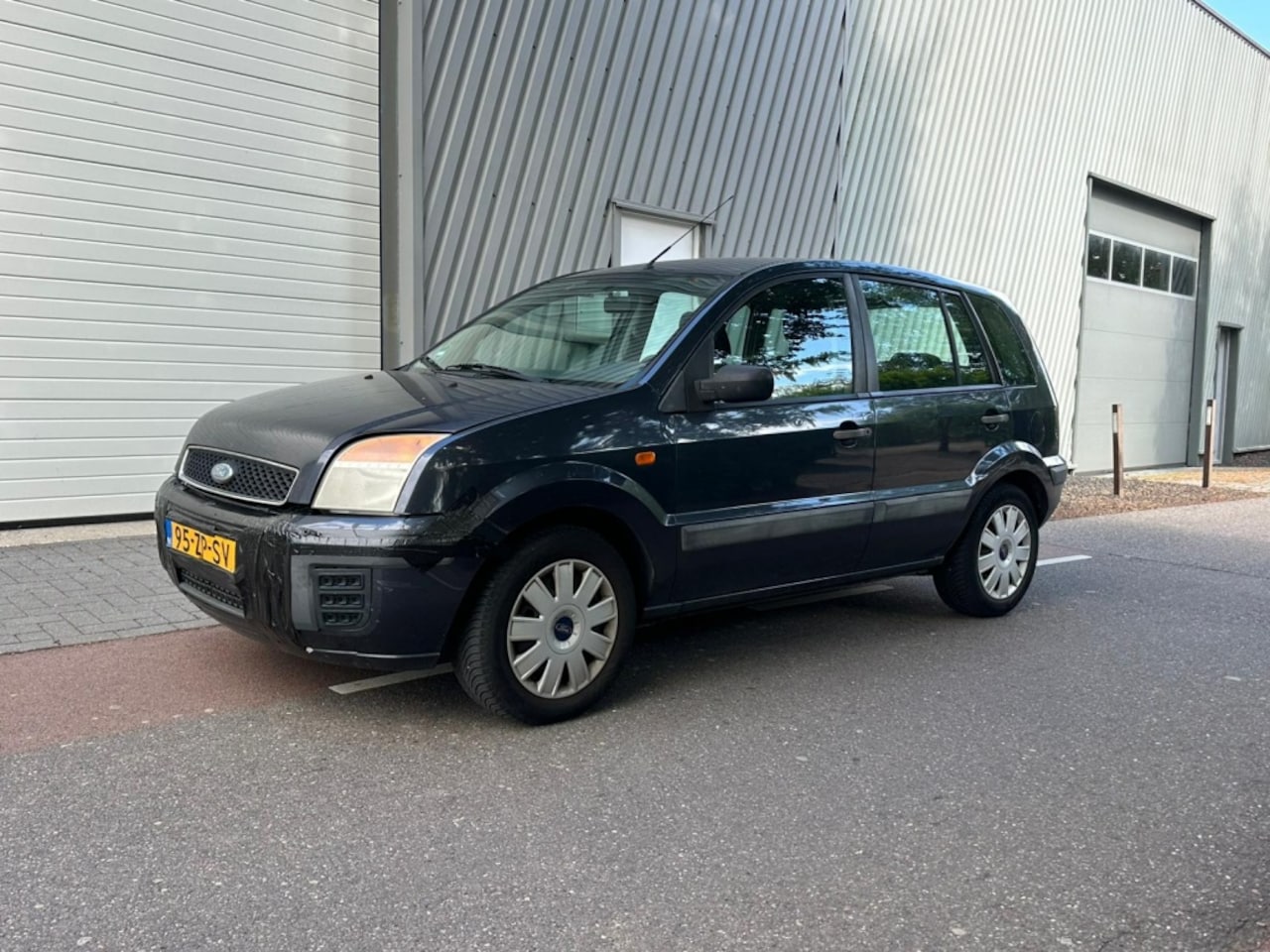 Ford Fusion - 1.4-16V Cool & Sound - AutoWereld.nl