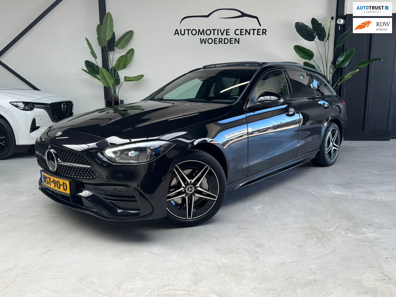 Mercedes-Benz C-klasse Estate - 300 e AMG Line PANO HUD BURMESTER MEMORY SFEERVERLICHTING - AutoWereld.nl