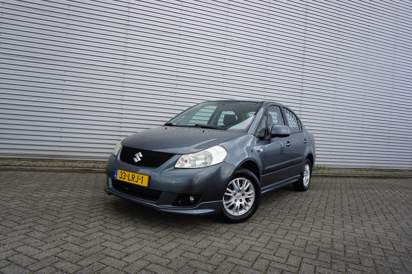 Suzuki SX4 - 1.6 Exclusive Airco / Elektr. ramen / Parkeersens. / Trekhaak / Lm velgen / NAP - AutoWereld.nl