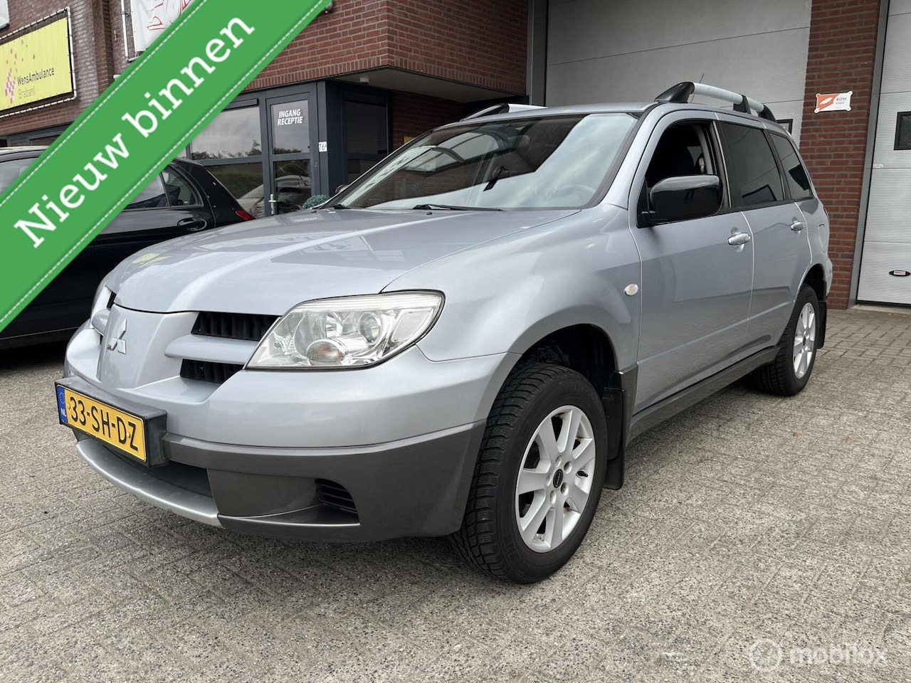 Mitsubishi Outlander - 2.0 Invite plus AIRCO*TREKHAAK*APK 5-27 - AutoWereld.nl