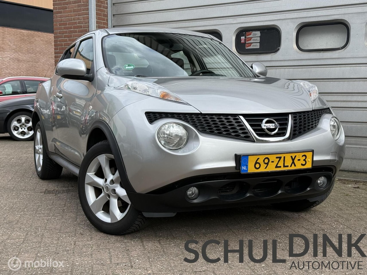 Nissan Juke - 1.6 Acenta AUTOMAAT|TREKHAAK|CRUISE CONTROLE - AutoWereld.nl