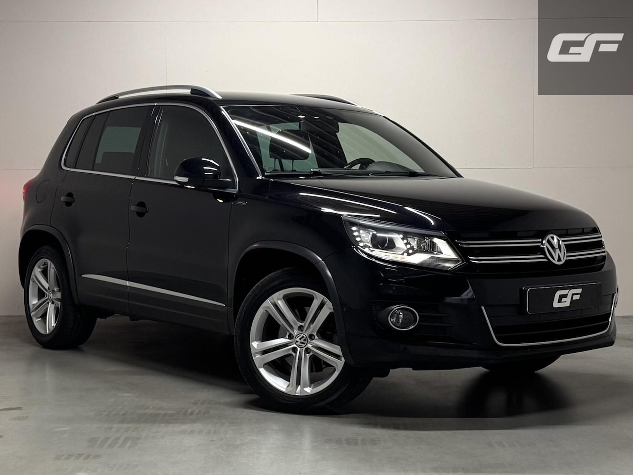 Volkswagen Tiguan - 1.4 TSI Sport&Style DSG Navi Cruise Camera Trekh. - AutoWereld.nl
