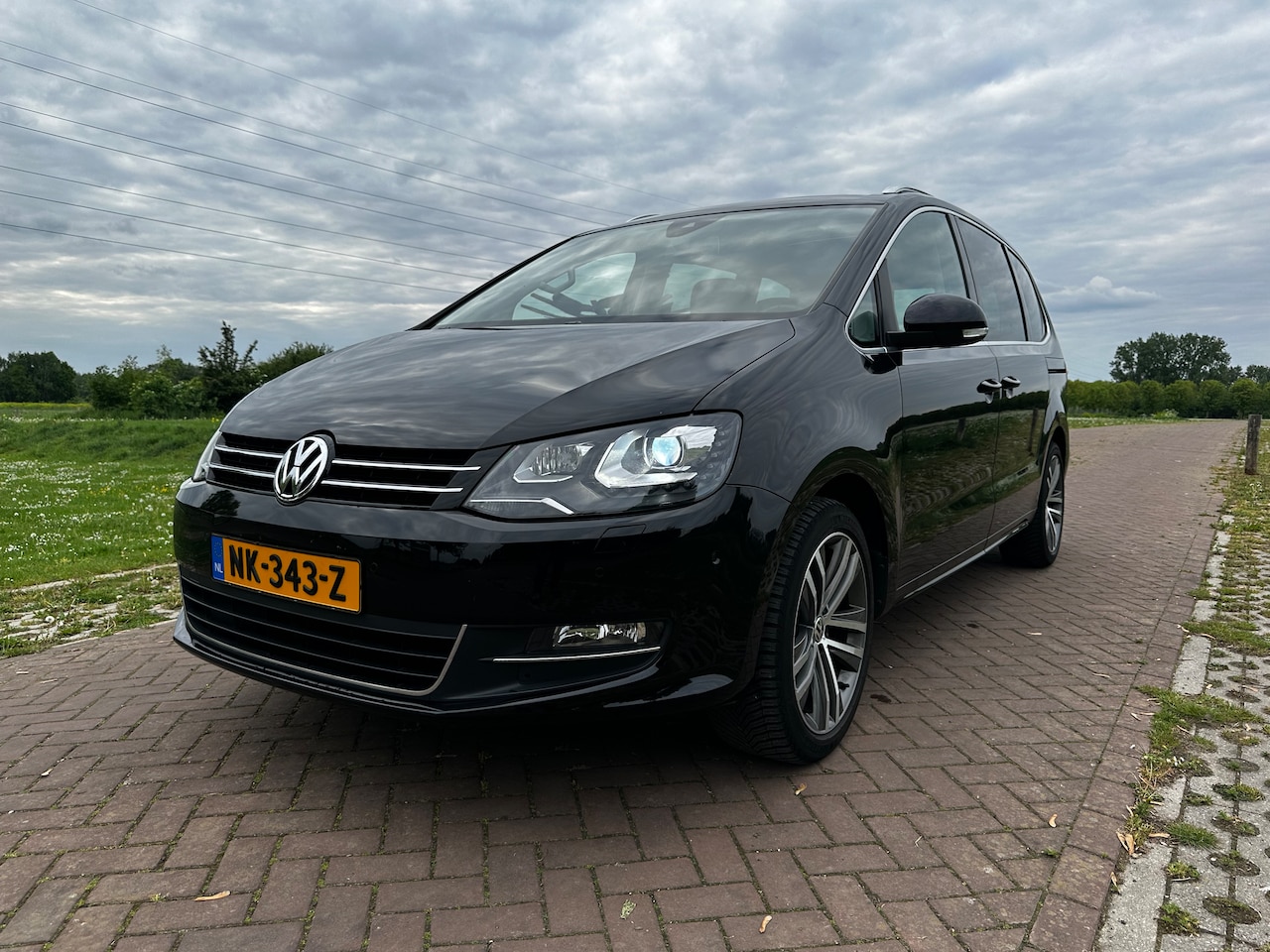 Volkswagen Sharan - 2.0 TSI Highline 7p. Panoramadak - Keyless - Memory stoelen - AutoWereld.nl