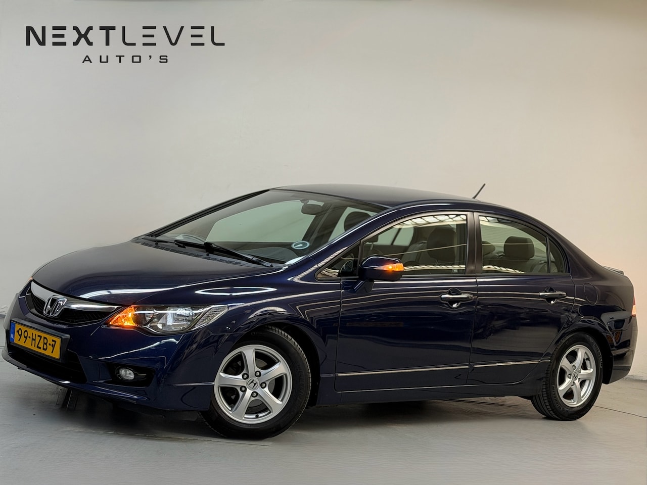 Honda Civic - 1.3 Hybrid Elegance Automaat Airco Cruise Stoelverwarming - AutoWereld.nl