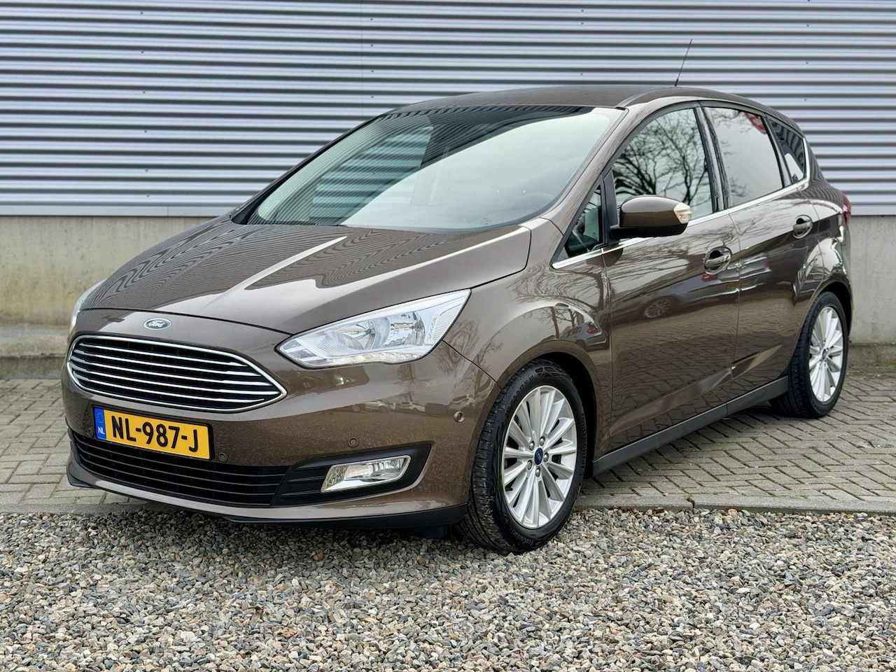 Ford C-Max - 1.0 Titanium 125 pk [ fm navi, cruise, 17``lmv, pdc ] - AutoWereld.nl