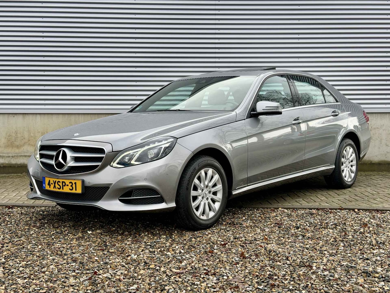 Mercedes-Benz E-klasse - 200 Ambition Avantgarde [ pano schuifdak, fm navi, leer, pdc, trekhaak ] - AutoWereld.nl