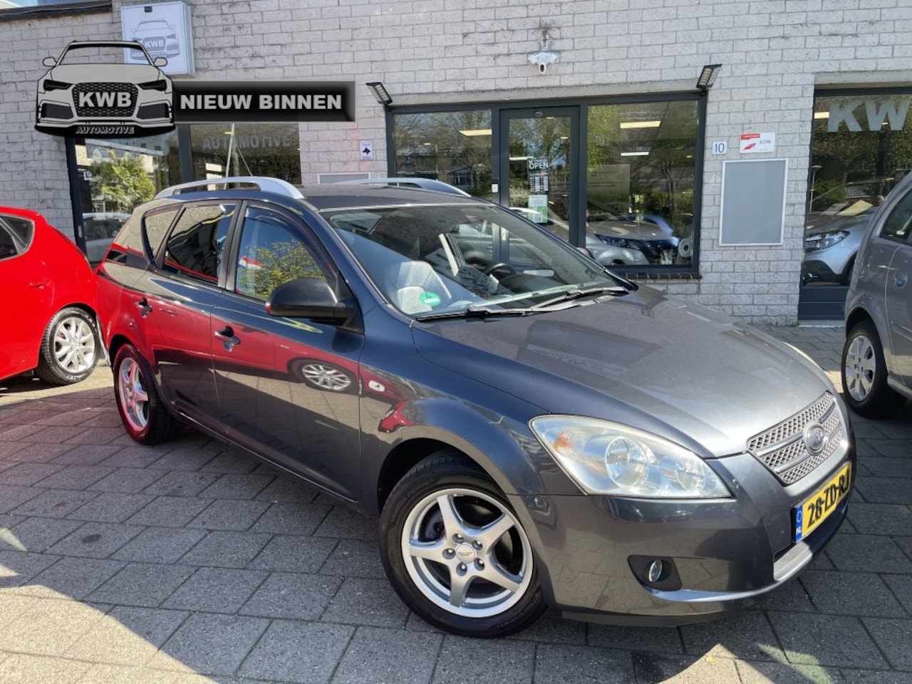 Kia Cee'd Sporty Wagon - 1.6 X-clusive NW Apk Airco Stoelverw Leer - AutoWereld.nl