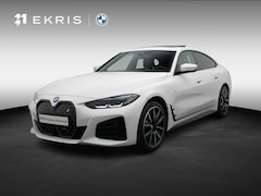 BMW i4 - eDrive40 M Sportpakket Pro | Stuurwielrand Verwarmd | Achteruitrijcamera | Schuifdak | DAB