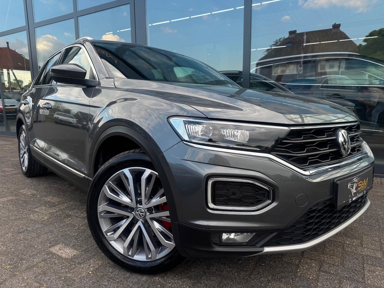 Volkswagen T-Roc - 2.0 TSI 4Motion Sport | Carplay | Trekhaak - AutoWereld.nl