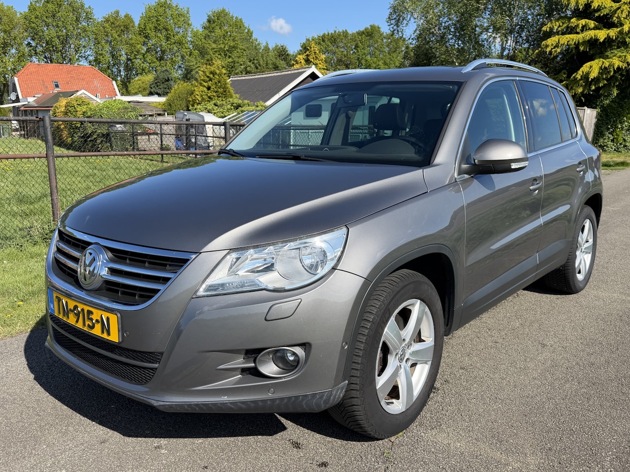 Volkswagen Tiguan - 2.0 TSI Sport&Style 4Motion Navi/LEER/Schuif/PanoDak/ECC - AutoWereld.nl