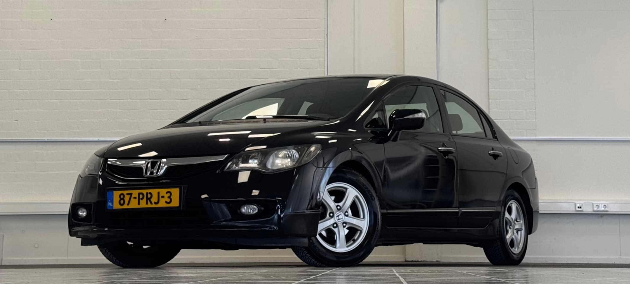 Honda Civic - 1.3 Hybrid Elegance Garantie 3e Eigenaar APK 3-2027 - AutoWereld.nl