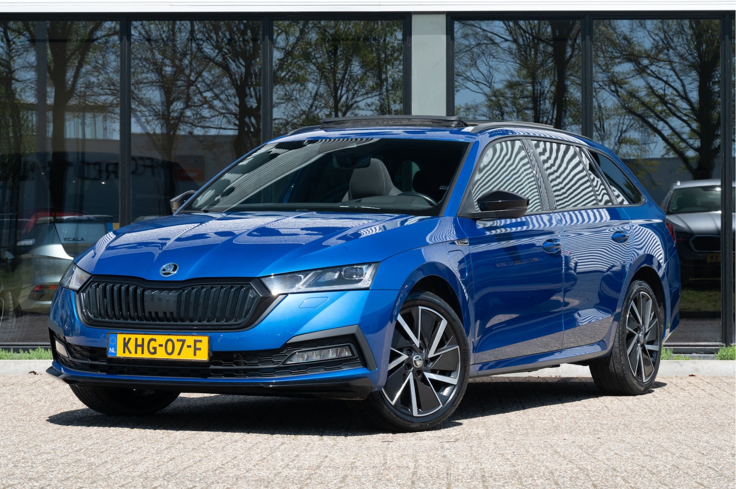 Skoda Octavia Combi - 1.4 TSI iV PHEV Sportline Business | Afn. trekhaak | Pano | HUD | Canton | - AutoWereld.nl