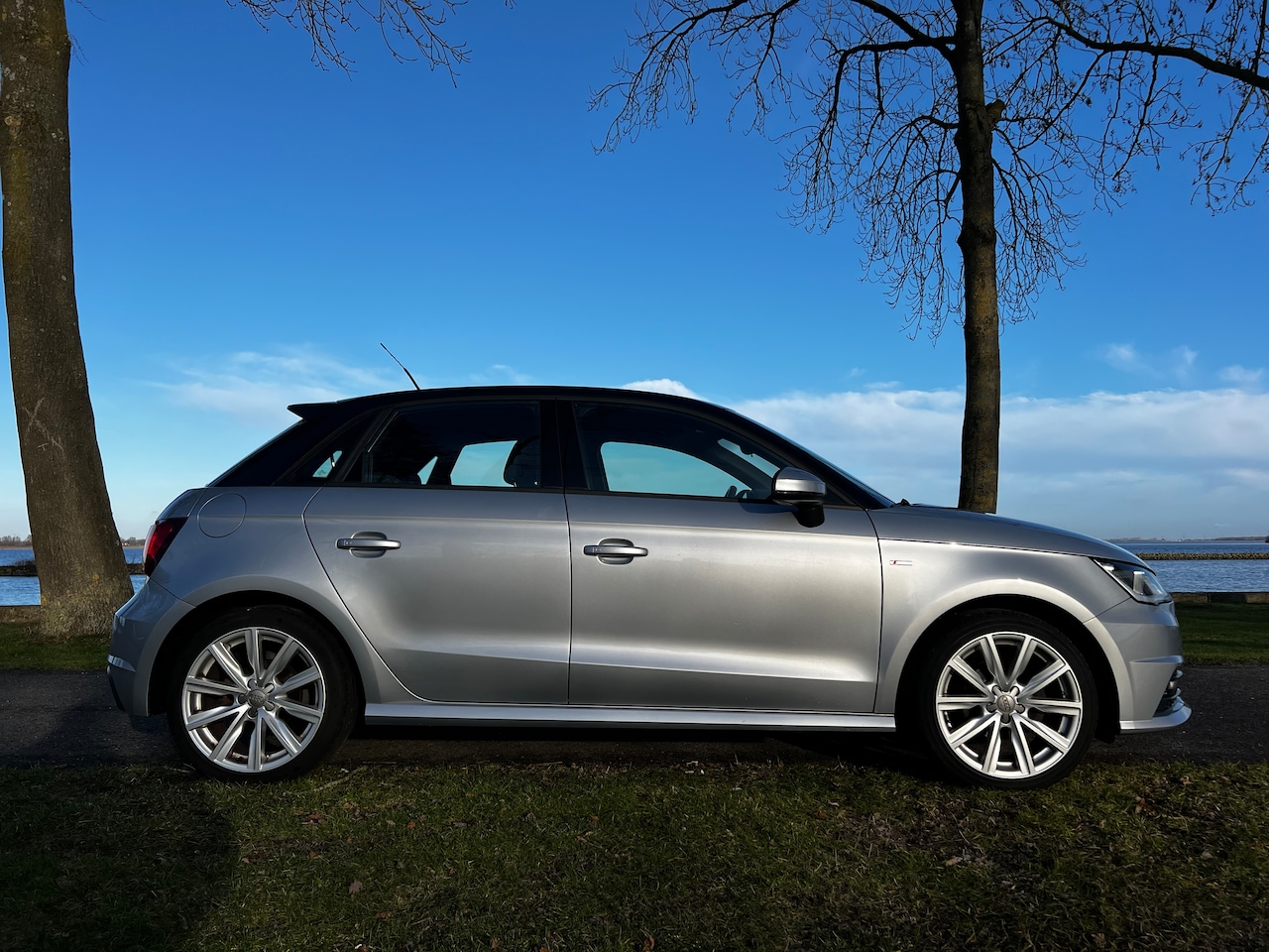 Audi A1 Sportback - 1.0 TFSI Sport S line Edition S line Edition + Brilliant Black dak, MMI navi, climate, Cruise Control - AutoWereld.nl