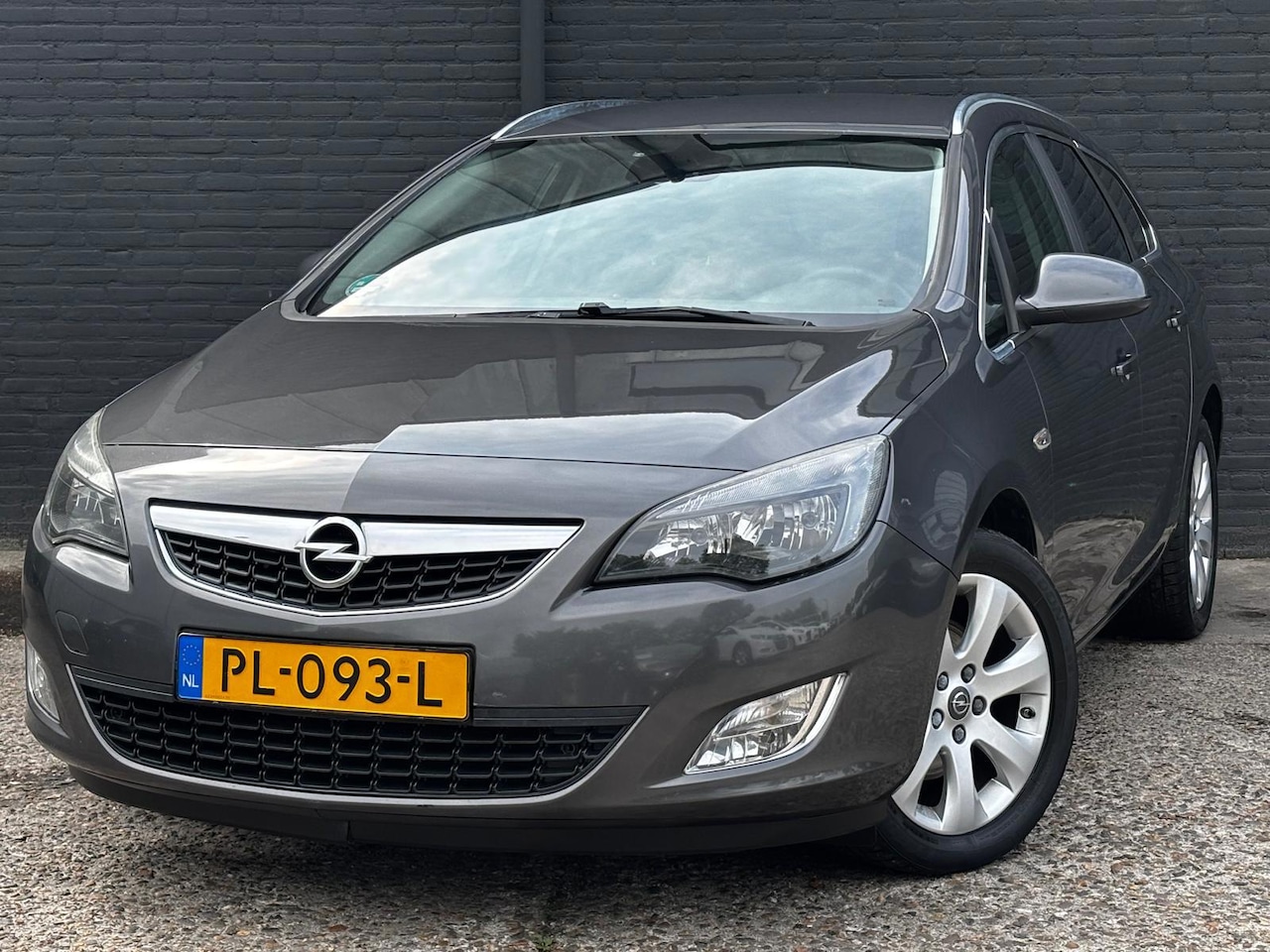Opel Astra Sports Tourer - 1.7 CDTi Cosmo AIRCO | NAVI | CRUISE | LEDER | NWE APK - AutoWereld.nl